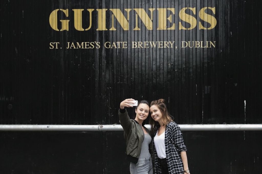 Selfies at Guinness sign at Guinness Storehouse at St James Gate Dublin 8Web Size