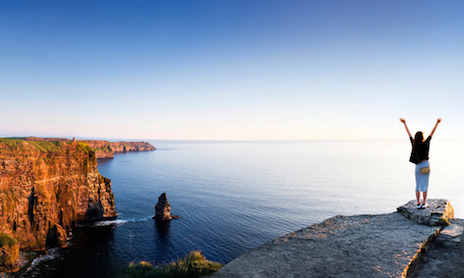 cliffs-of-moher-and-girl-with-out-stretched-arms
