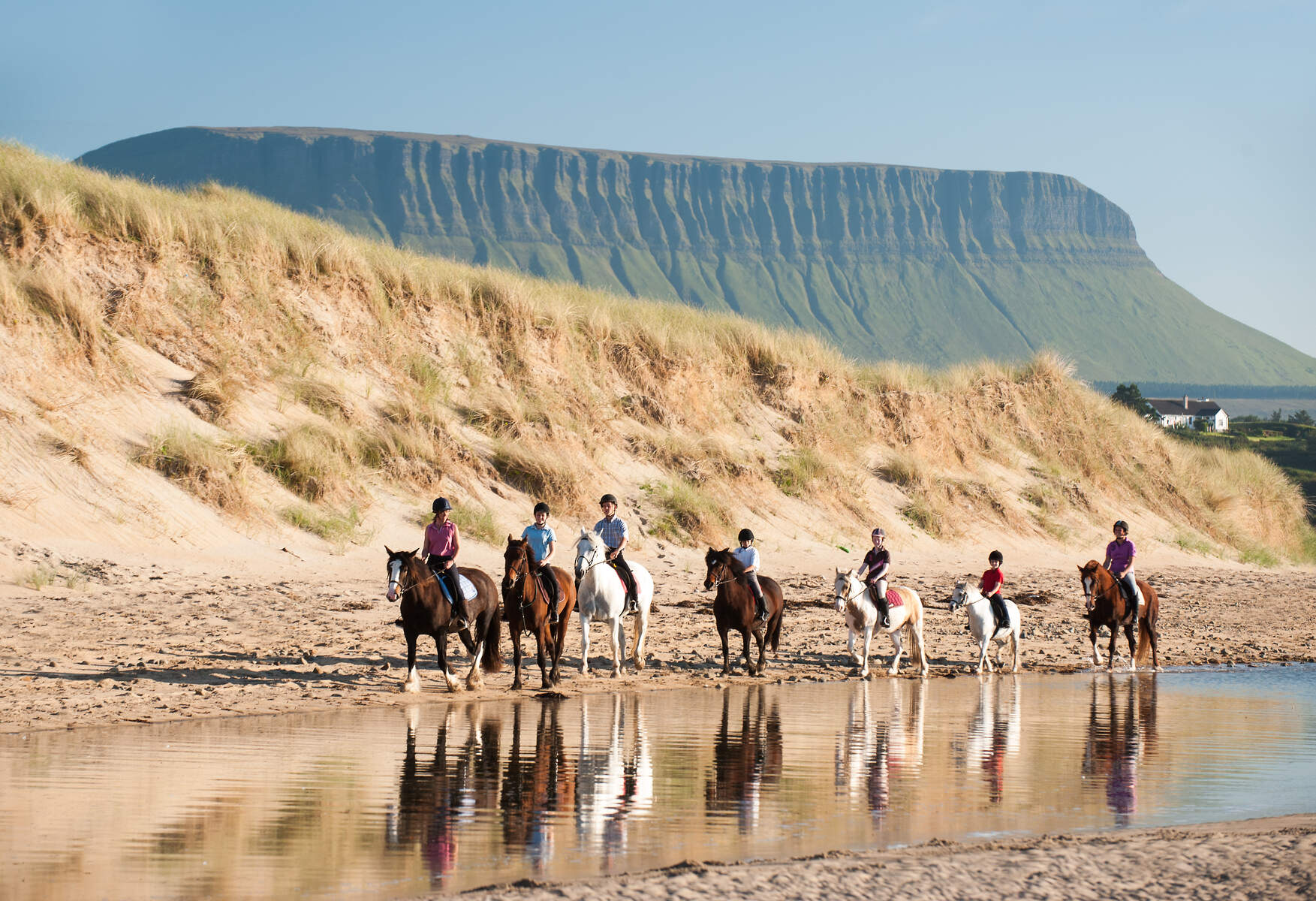 Horse-riders-on-streedagh-beach-with-ben-bulben-background