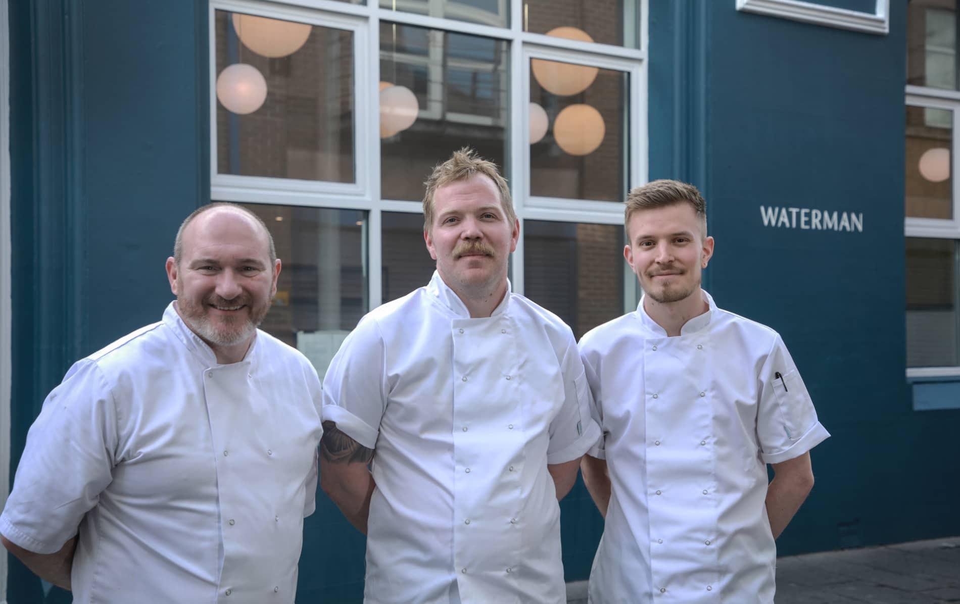 Chefs Niall McKenna, Cathal Duncan, and Aaron McNeice outside Waterman restaurant, Belfast.
