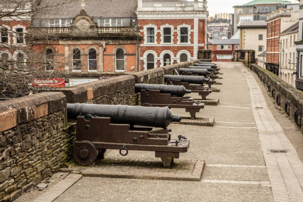 Historic cannons line the Derry City Walls, overlooking central Derry~Londonderry and reflecting its 17th-century fortifications.