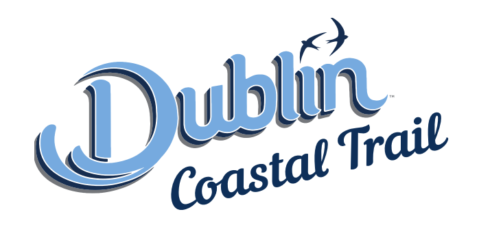 Stylised blue 'Dublin Coastal Trail' logo with two swallows flying overhead, evoking motion and coastal charm.