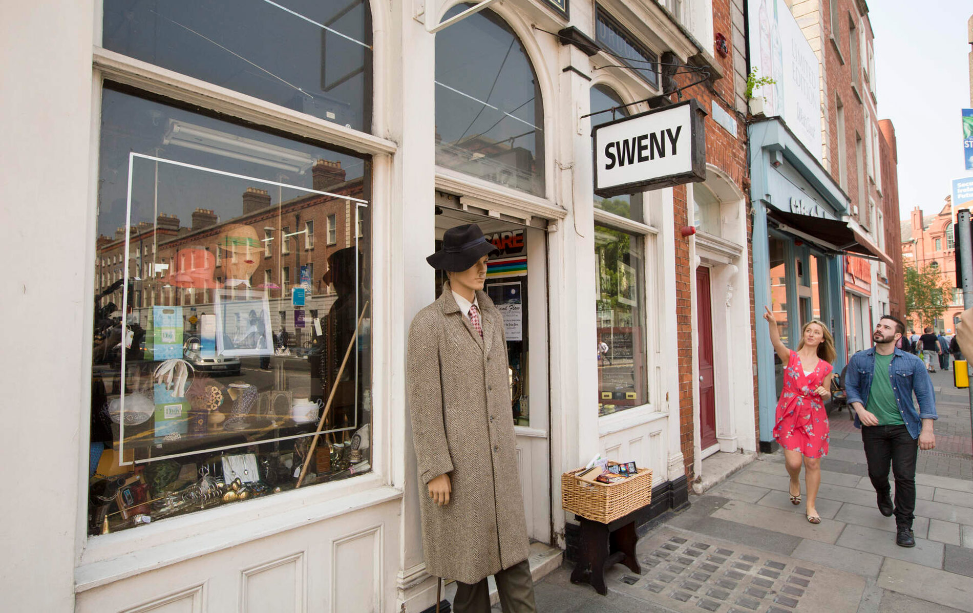 Exterior of Sweny’s Pharmacy in Dublin, famous from James Joyce’s Ulysses, with a mannequin at the door.