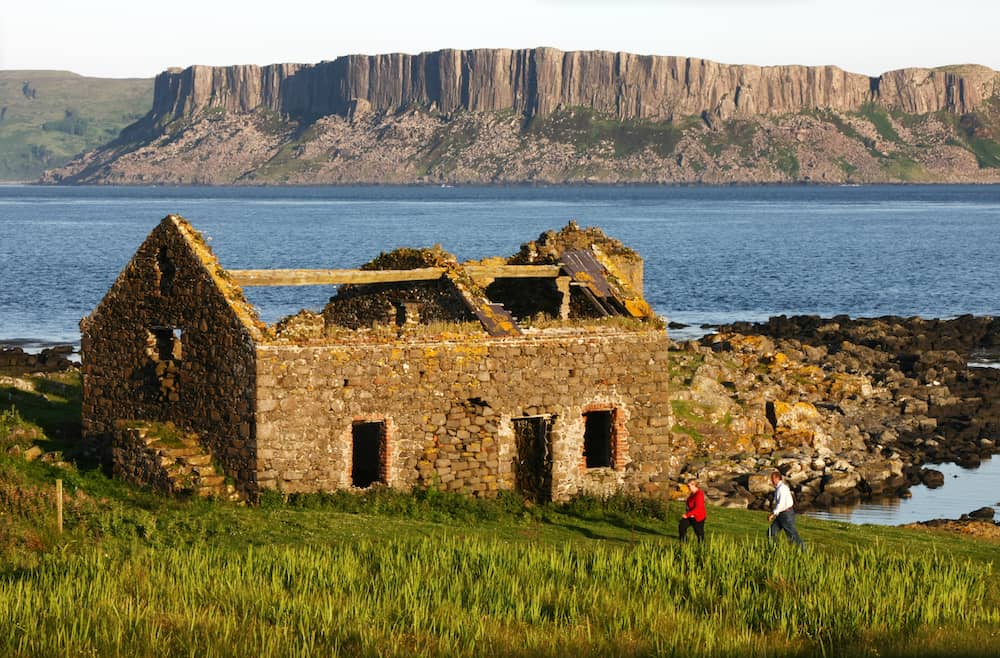 Ruined stone cottage by the coast at Ushet Point on Rathlin Island, County Antrim, Northern Ireland.
