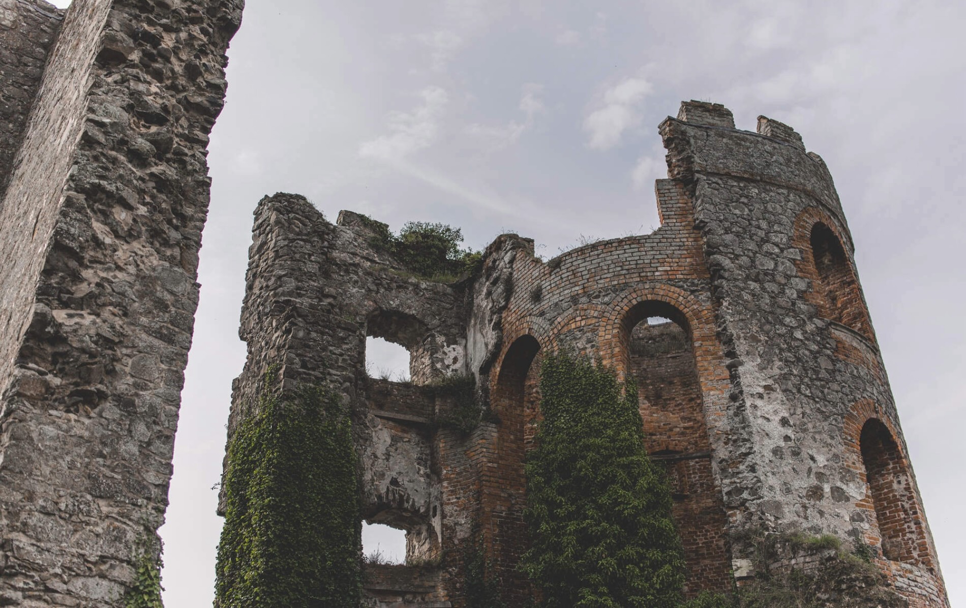 Ruins of Shane's Castle in County Antrim, with ivy-covered stone walls and towers.