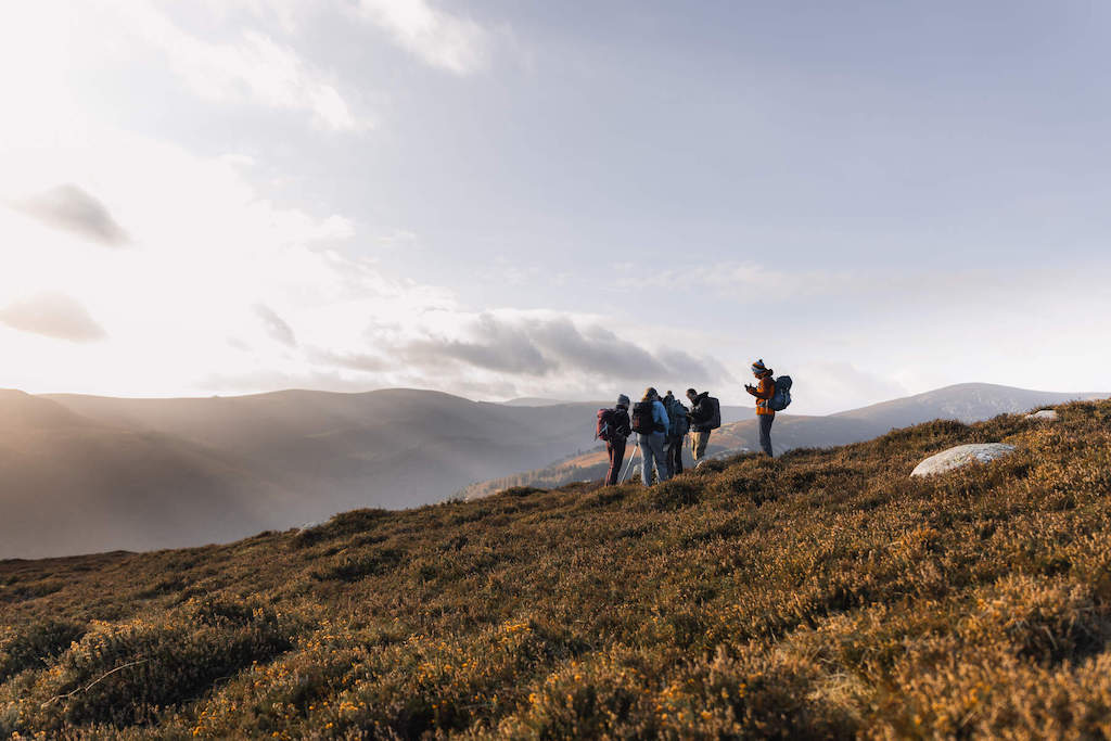 Group of hikers on a misty autumn morning in the Wicklow Mountains National Park.