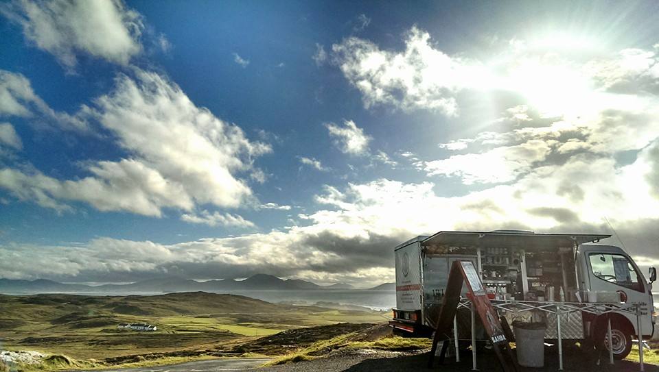 Caffe Banba food truck serving coffee and snacks with sweeping Donegal mountain views.
