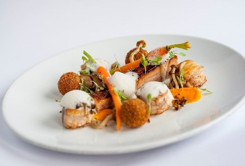 Fine dining dish with pork, croquettes, carrots and mushrooms, artfully plated at Lemon Tree, Donegal.