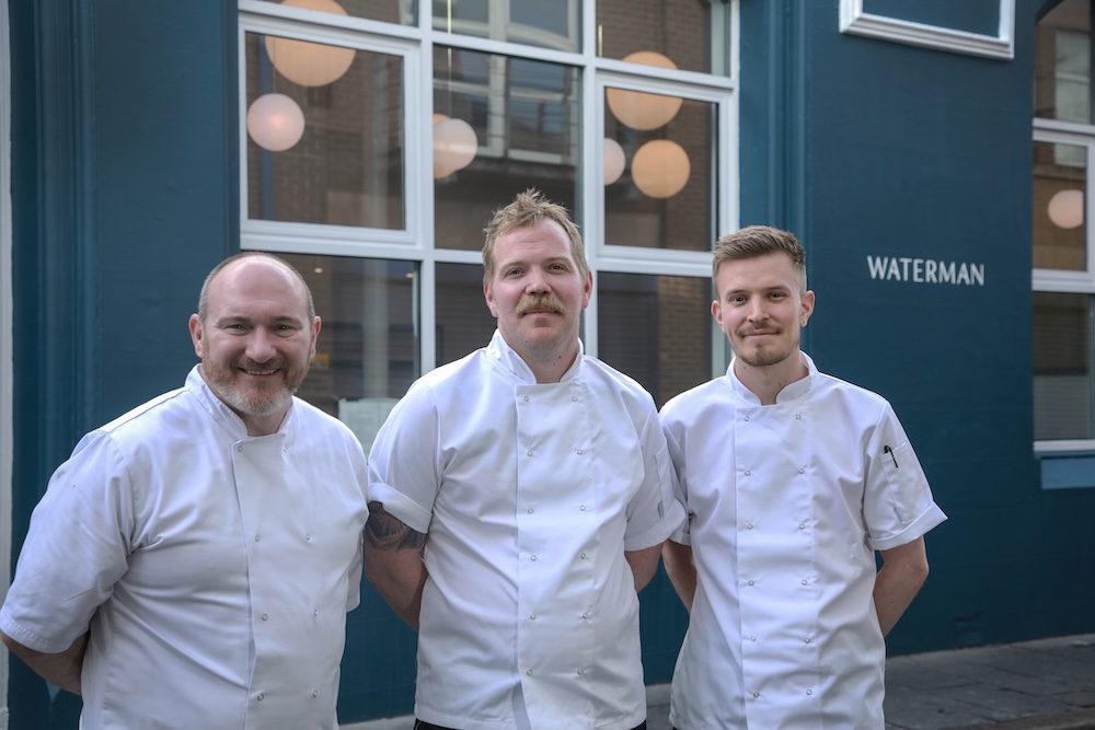 Chefs standing outside Waterman restaurant in Belfast city centre.