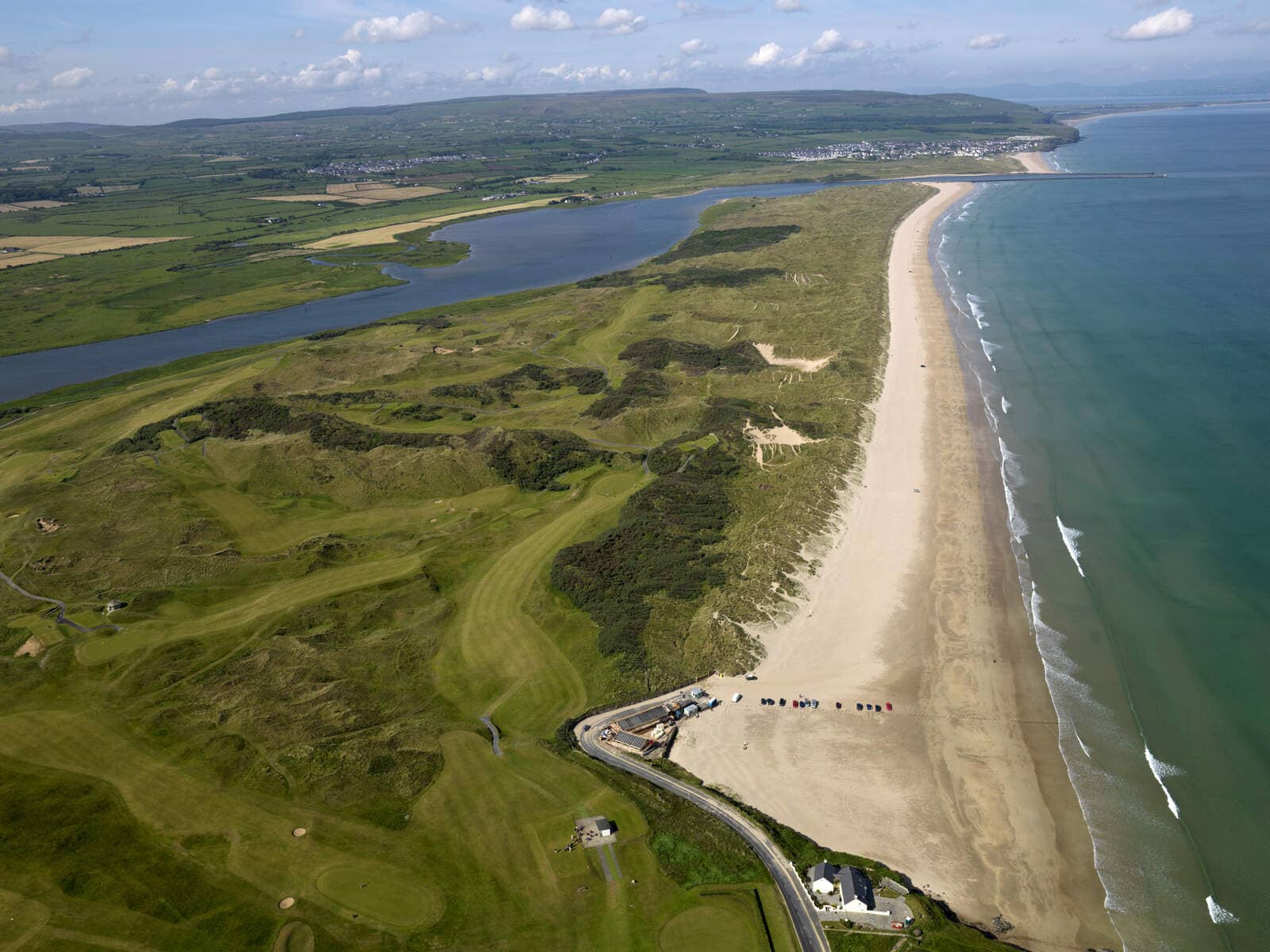 Aerial view of Portstewart Strand and adjacent golf course beside the Atlantic coast in County Londonderry.