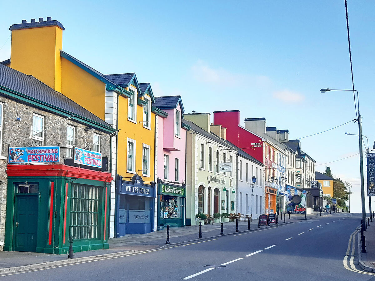 Colourful buildings lining the main street in Lisdoonvarna, County Clare.