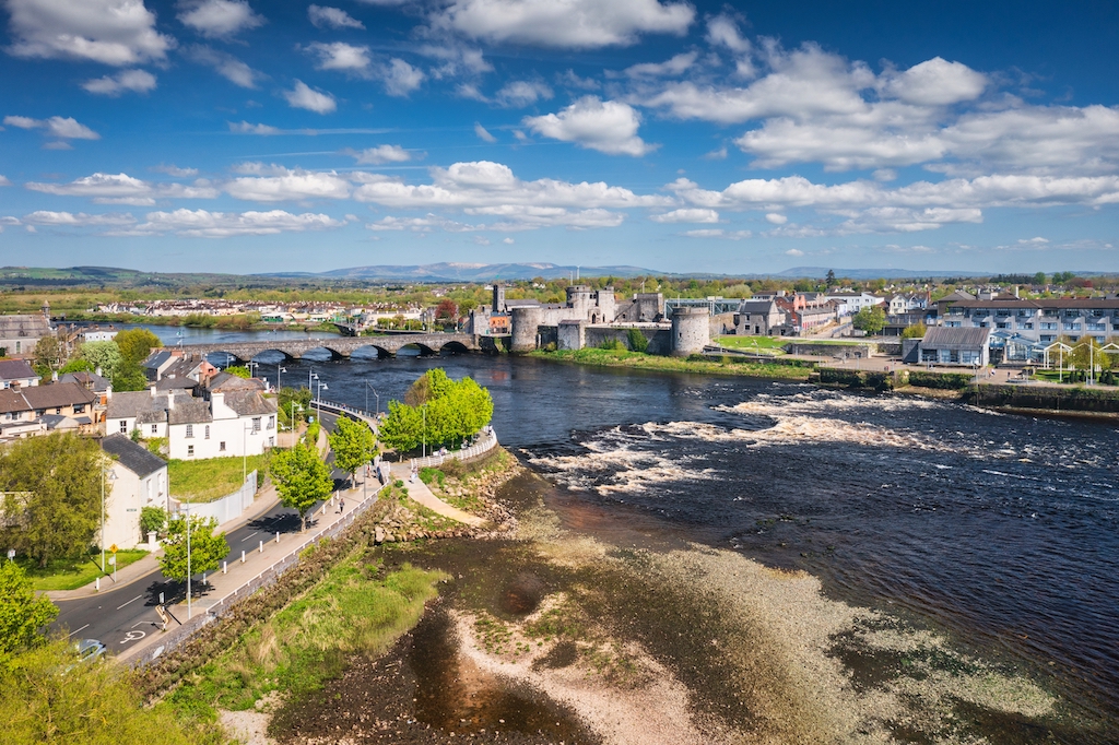 Aerial view of King John's Castle and the River Shannon flowing through Limerick City.