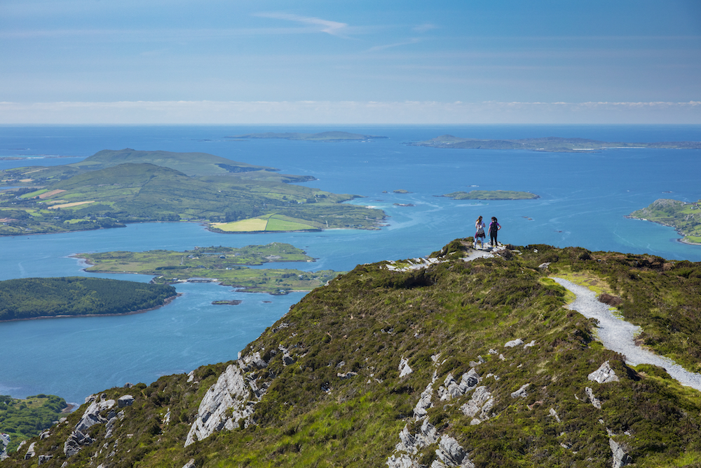Walkers enjoy panoramic views from Diamond Hill in Connemara National Park, County Galway.