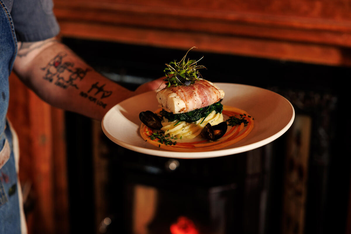 A chef presents a seafood dish in Byrne's of Ennistymon in County Clare.