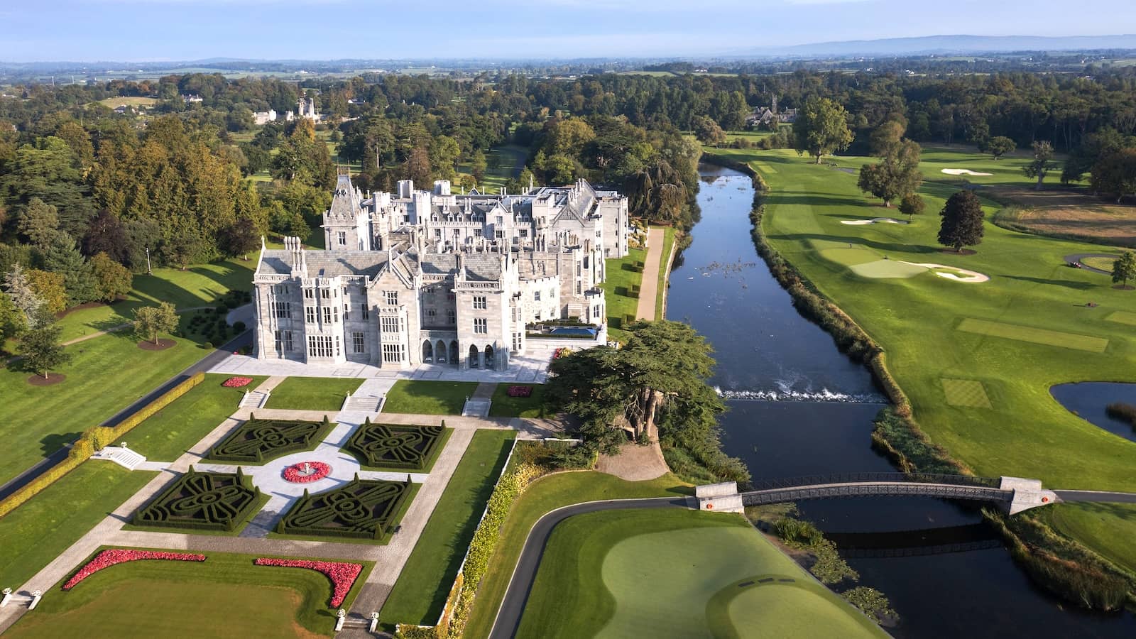 Aerial view of Adare Manor in County Limerick with historic castle, gardens and golf course.