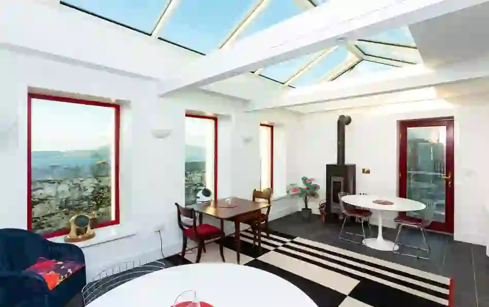 Clare Island Lighthouse in County Mayo with skylight ceiling, wood-burning stove and sea views.