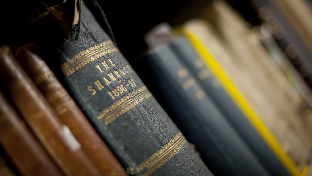 Close-up of antique Irish books including The Shamrock, referencing Ireland’s rich literary tradition.