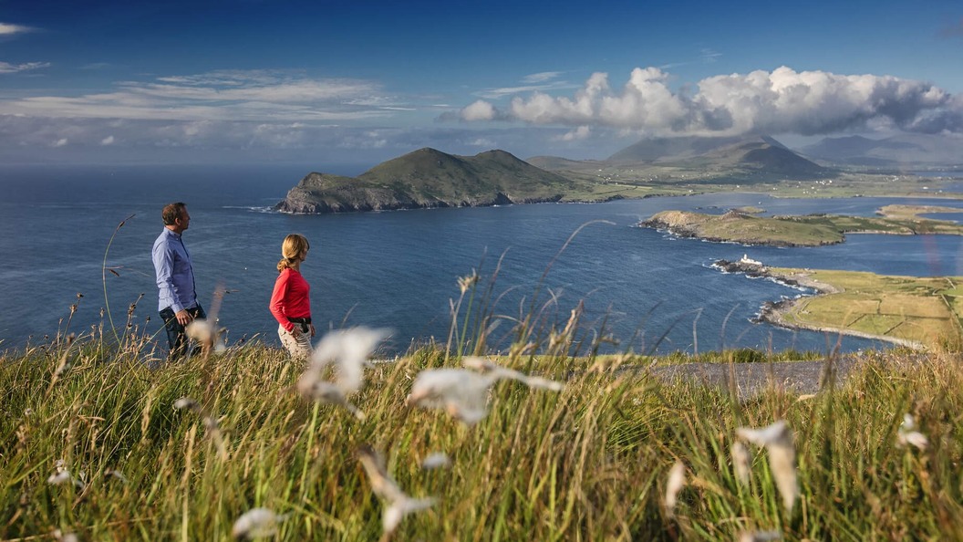 Couple walking on Geokaun Mountain Valentia Island Co Kerrywebsize2500x1200px