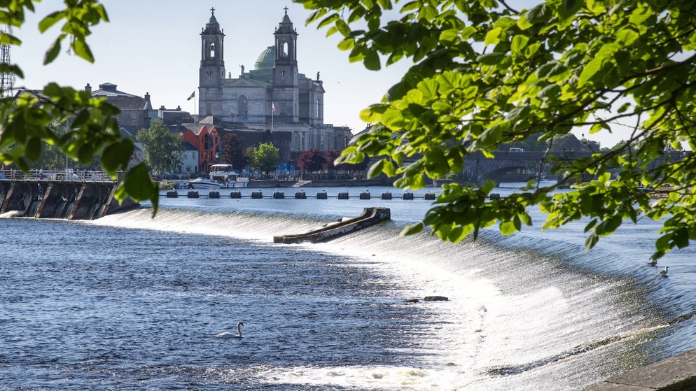 Athlone town and the Church of Saints Peter and Paul overlooking the River Shannon in Ireland’s Hidden Heartlands.