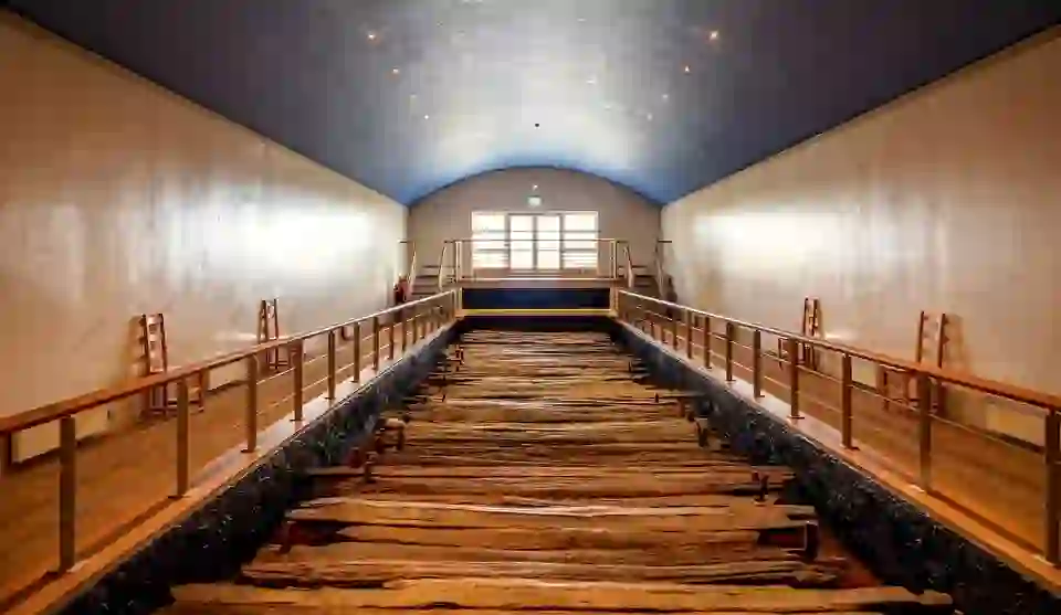 Ancient Corlea Trackway in County Longford, preserved Iron Age oak road displayed in a museum.
