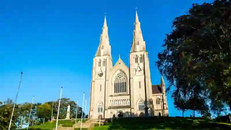St Patrick’s Roman Catholic Cathedral with twin spires and Gothic facade on a hill in Armagh city, Northern Ireland.