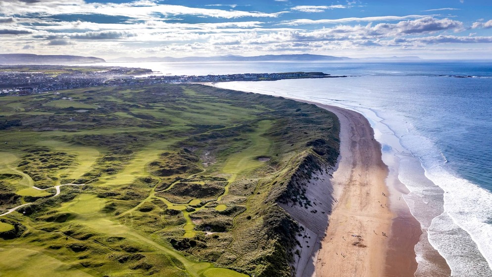 Aerial view of Royal Portrush Golf Club and Whiterocks Beach along the Causeway Coast in County Antrim, Northern Ireland.