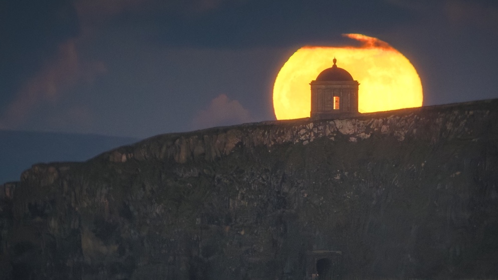 Black and white image of Poulnabrone dolmen in The Burren in County Clare evoking the ancient Celtic origins of Halloween.