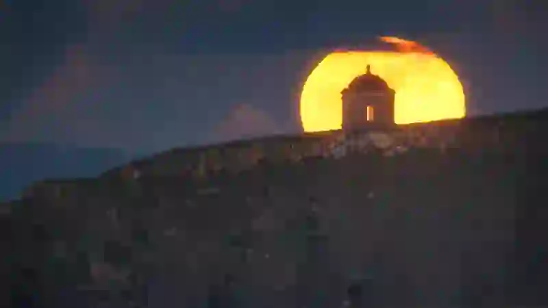 Black and white image of Poulnabrone dolmen in The Burren in County Clare evoking the ancient Celtic origins of Halloween.