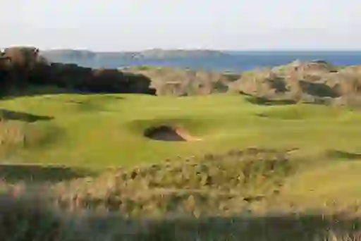 Royal Portrush Golf Course, County Antrim, with rolling dunes and sea views.