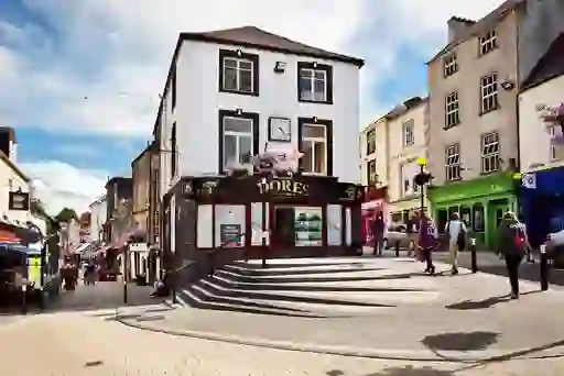Shoppers walking through Market Cross in Kilkenny City centre.