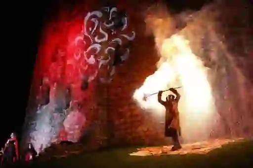 Fire performer with sparks flying at Puca Festival in County Meath.