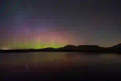 Northern Lights glowing in the night sky over Mayo Dark Sky Park in County Mayo.