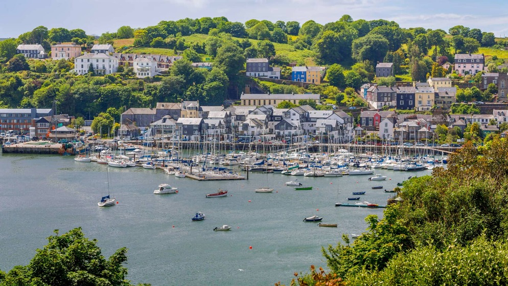 Colourful harbour town of Kinsale with yachts moored along the marina.