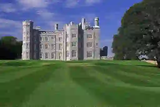Castle-like clubhouse rising above manicured fairways at Killeen Castle Golf Course in County Meath.