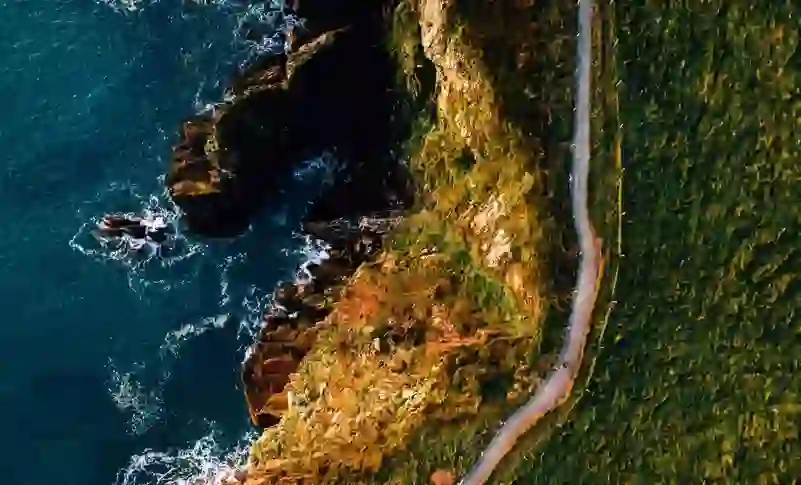 Cliffside trail meets the sea along St Declan’s Way, with dramatic coastal views in County Waterford.