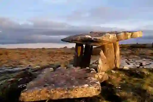 Poulnabrone Dolmen, an ancient portal tomb standing on the rocky limestone landscape of the Burren in County Clare.