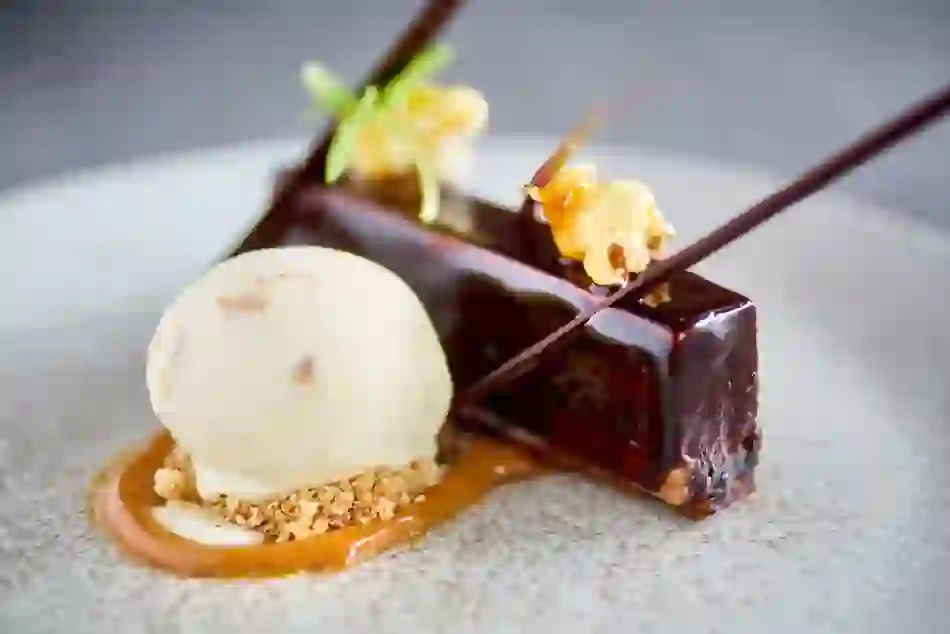 Gourmet dessert of chocolate cake with caramel popcorn and ice cream served in Donegal.