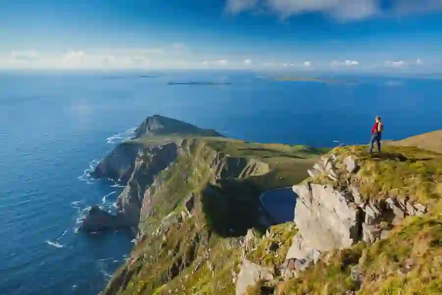 Walker looking towards Saddle Head from Croaghaun Achill Island Co Mayowebsize2500x1200px 1
