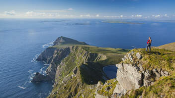 Walker looking towards Saddle Head from Croaghaun Achill Island Co Mayowebsize2500x1200px 1