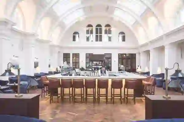 Bar beneath the vaulted atrium at Titanic Hotel Belfast in the Titanic Quarter.
