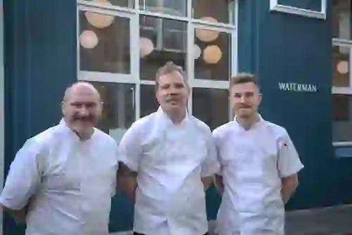 Chefs standing outside Waterman restaurant in Belfast city centre.