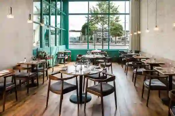 Dining room at OX restaurant overlooking the River Lagan in Belfast.