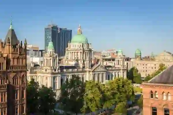 Belfast City Hall viewed across the city centre with the Grand Central Hotel behind.