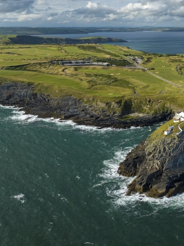 Aerial view of the Old Head of Kinsale lighthouse and cliffs, County Cork.