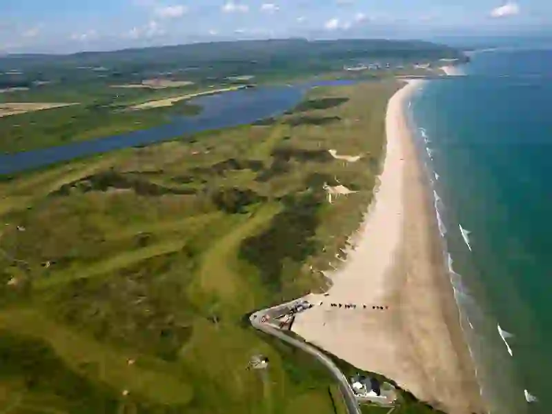 Aerial view of Portstewart Strand and adjacent golf course beside the Atlantic coast in County Londonderry.