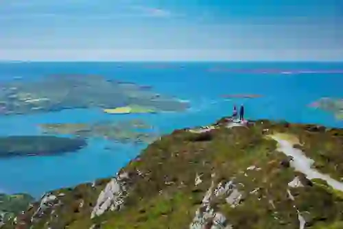 Walkers enjoy panoramic views from Diamond Hill in Connemara National Park, County Galway.