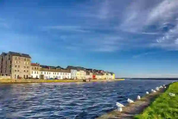 The Long Walk and River Corrib waterfront in Galway City on a sunny day.