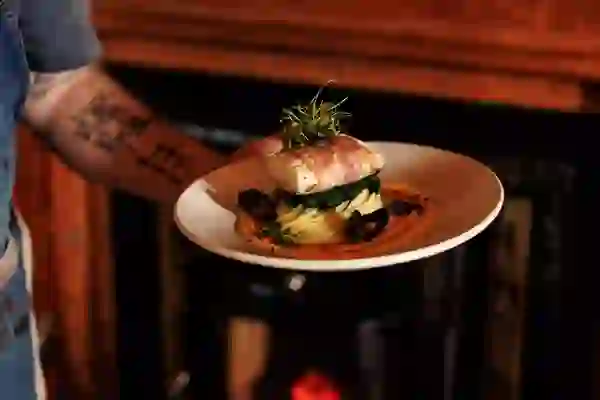 A chef presents a seafood dish in Byrne's of Ennistymon in County Clare.