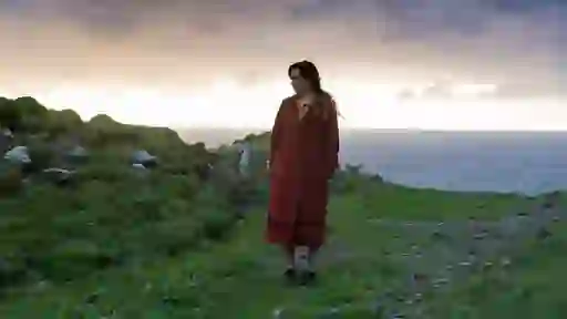 Colin Farrell and Barry Keoghan talk by the sea on Inis Mór in The Banshees of Inisherin.