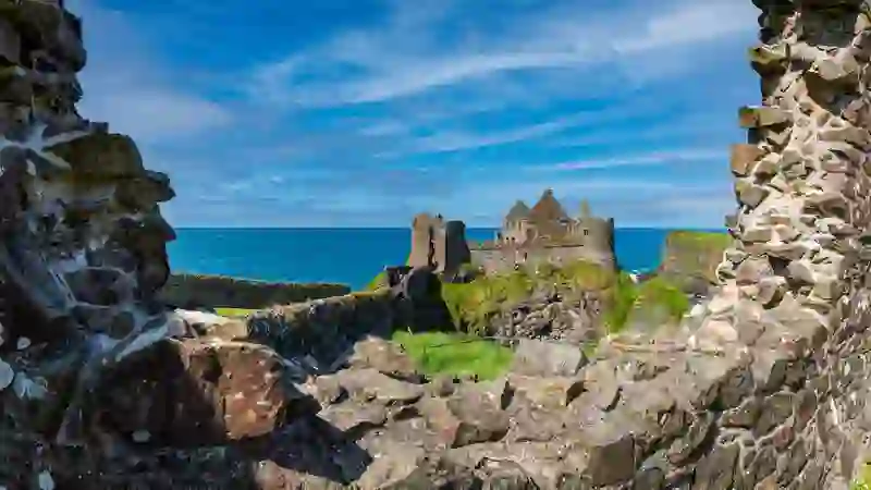 Dunluce Castle standing high on rugged cliffs along Northern Ireland’s coastline.
